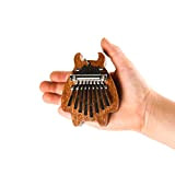 Mini Kalimba a 8 tasti, squisito pianoforte per dita, ottimo accessorio Marimba da regalare o da usare come ciondolo